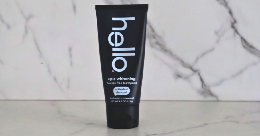 a tube of Hello Epic Whitening Toothpaste on a counter