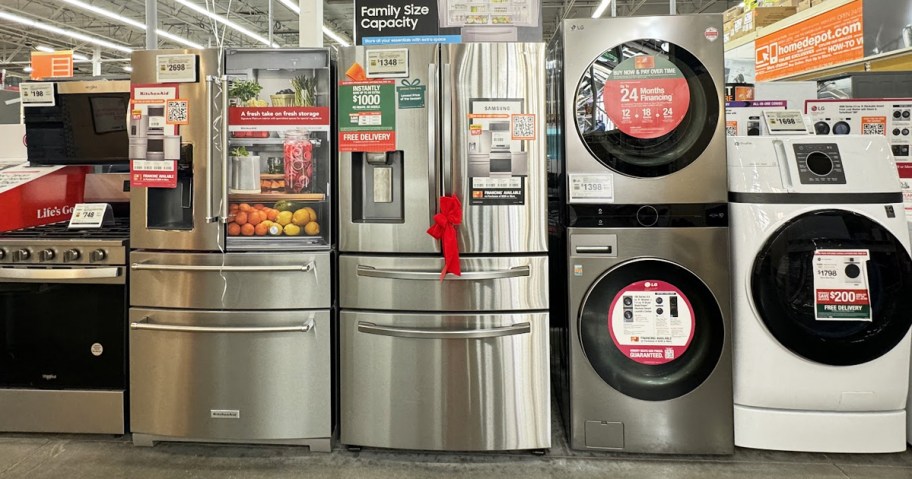 range, fridges, and washing machines on display in home depot store