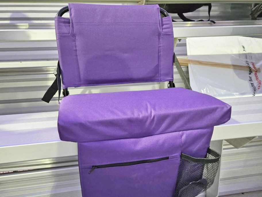 purple stadium seat on bleachers