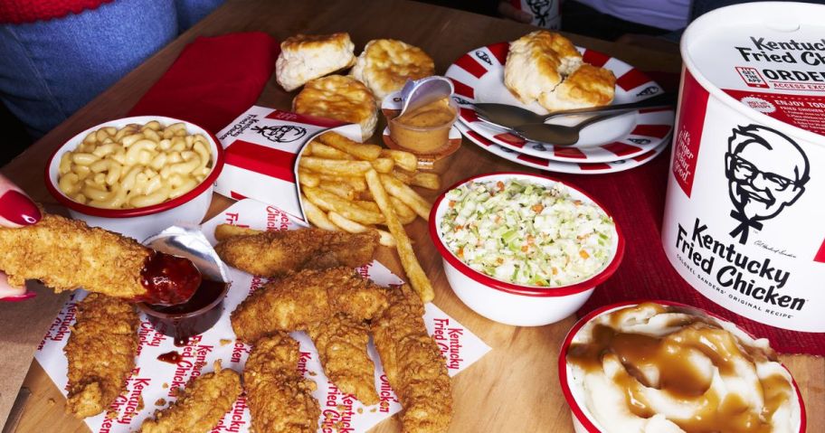 Table filled with KFC food and their bucket