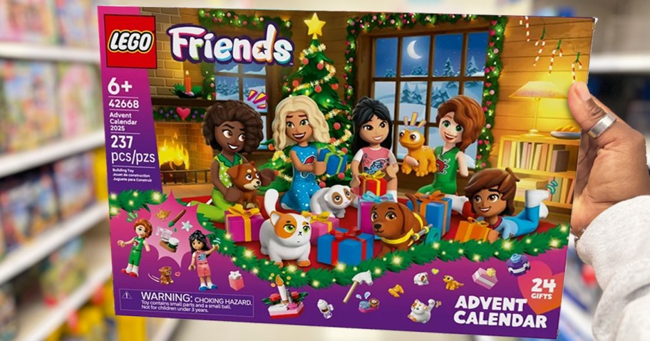 hand holding up box for LEGO Friends Advent Calendar in store