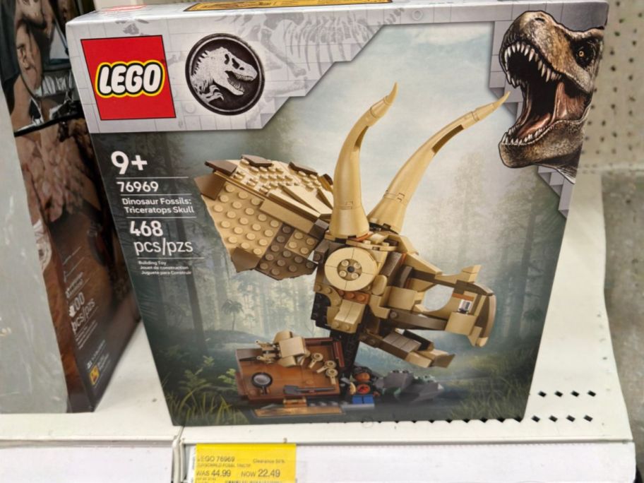LEGO Jurassic World Dinosaur Fossils Triceratops Skull on store shelf