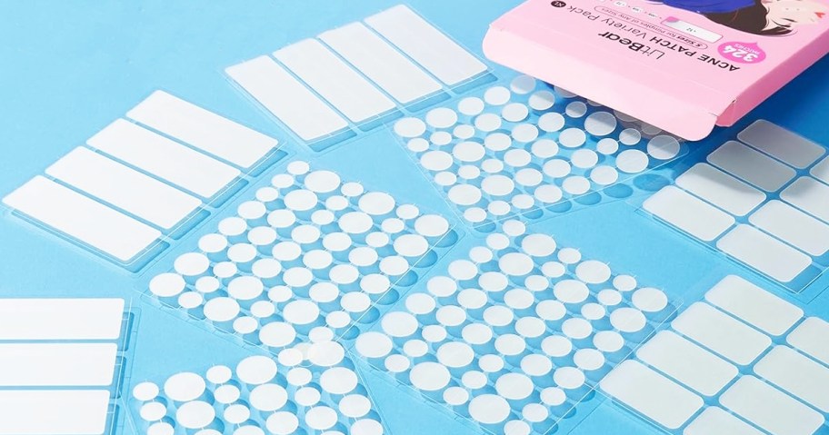 pimple patches set on a blue background