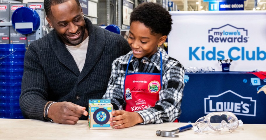 dad and son building a lowe's washing machine bank