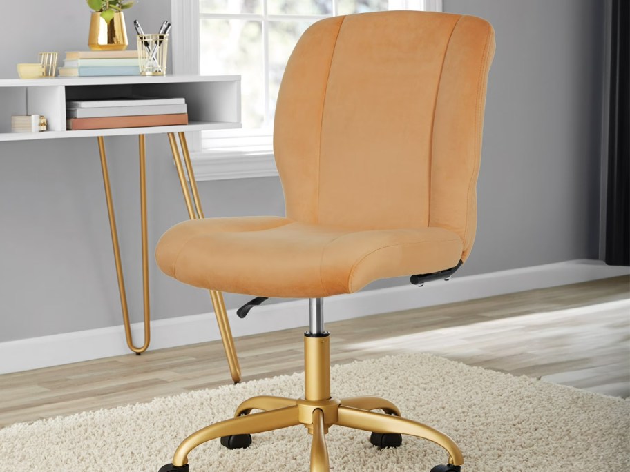 tan office chair next to a desk
