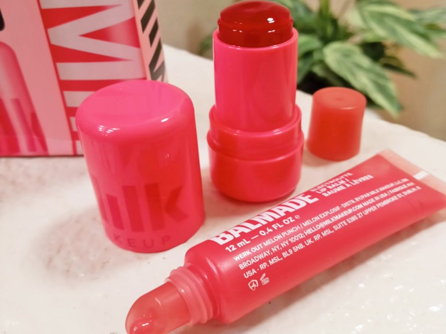pink Milk Makeup Jelly Tint + Lip Balm Set on counter