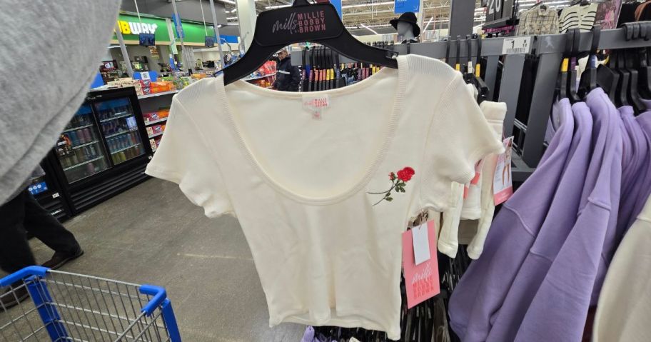 Mills by Millie Bobby Brown Women's Embroidery Ribbed Crop T-Shirt in hand in store