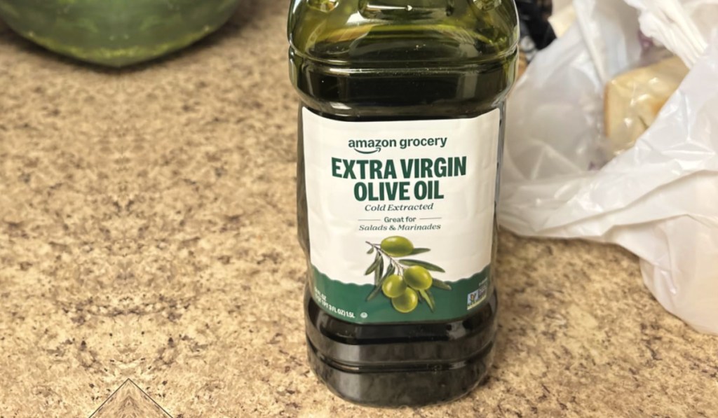 Amazon brand olive oil on granite countertop