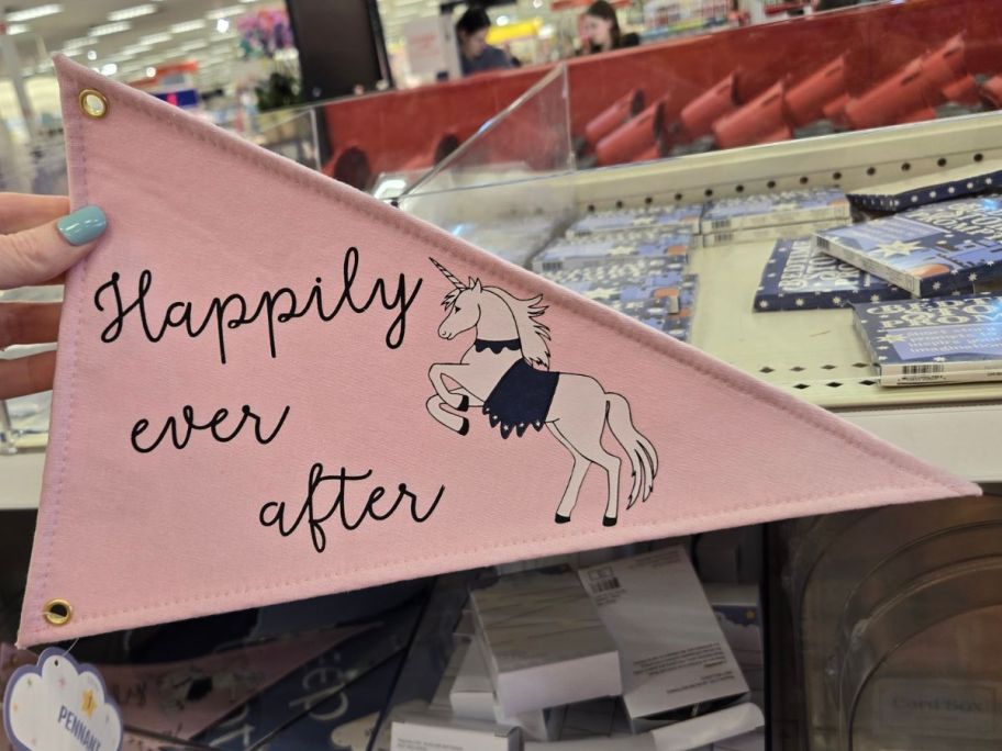 Happily Ever After pennant in hand in store