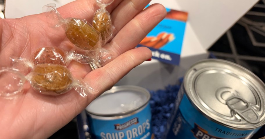 Person holding Progresso soup drops hard candies