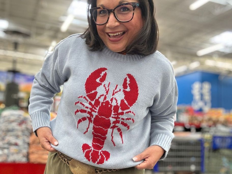 Woman wearing an Americana Lobster Sweater from Sam's Club