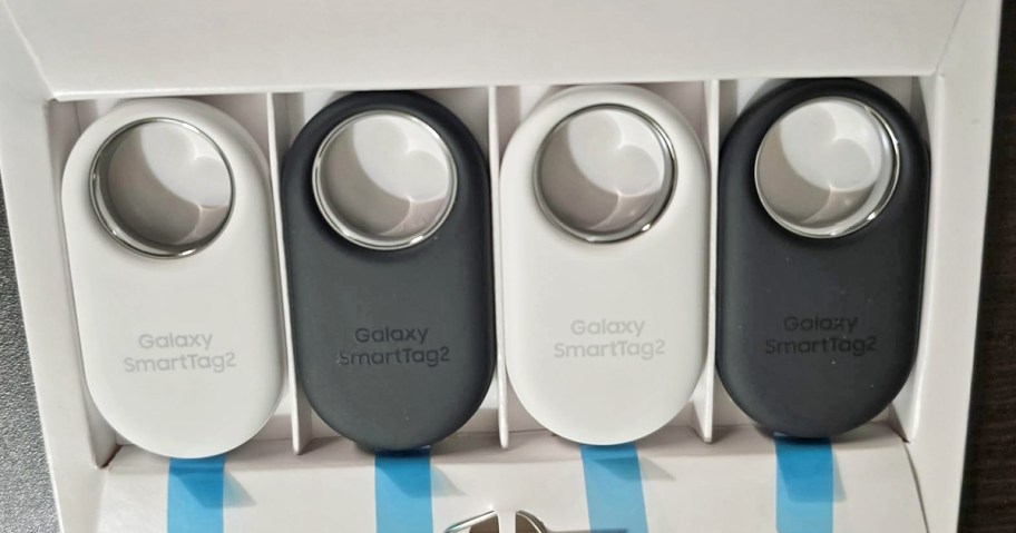 black and white smart tags in their box