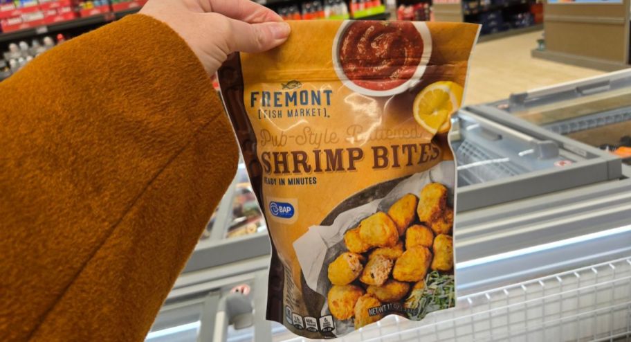 hand holding Shrimp bites at the store