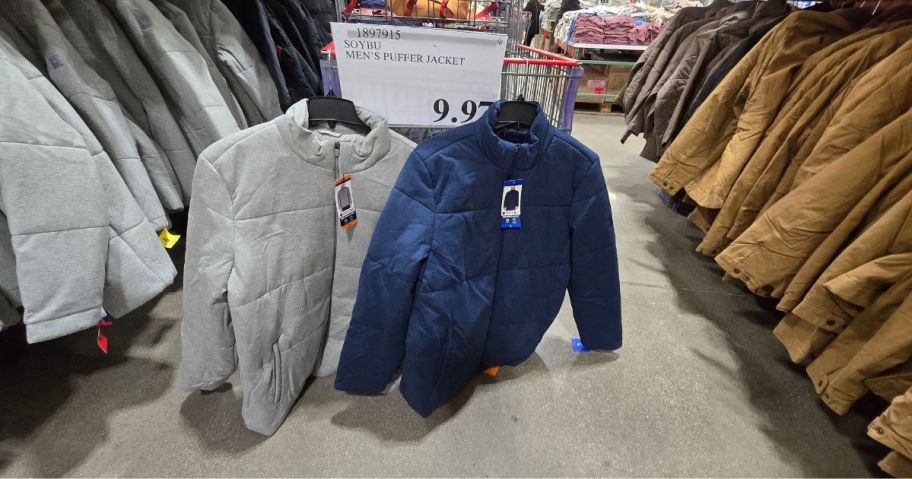 2 men's coats displayed in a store