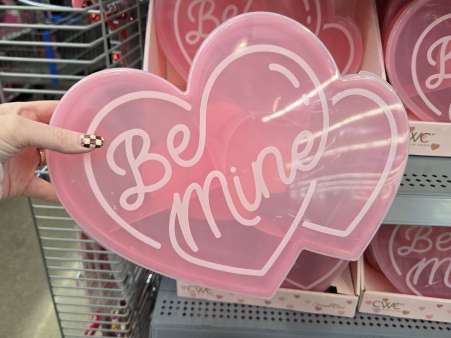 A pink heart shaped "Be Mine" snack box from Walmart.