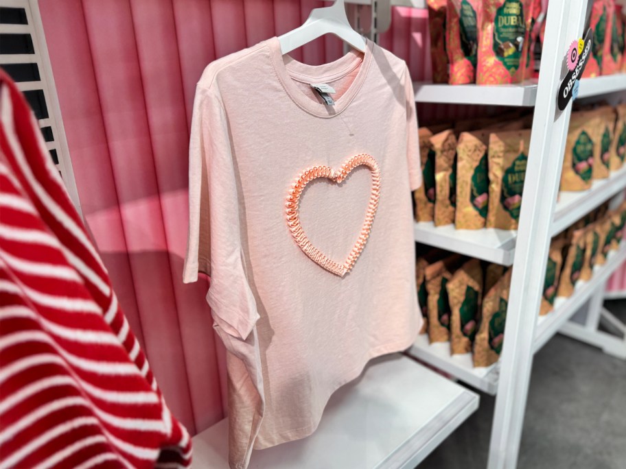 Pink boxy heart t-shirt hanging at Target