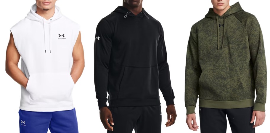 three men in white, black, and green hoodies