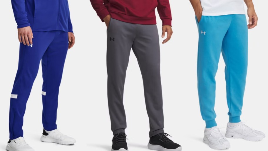 three men in blue and grey pants