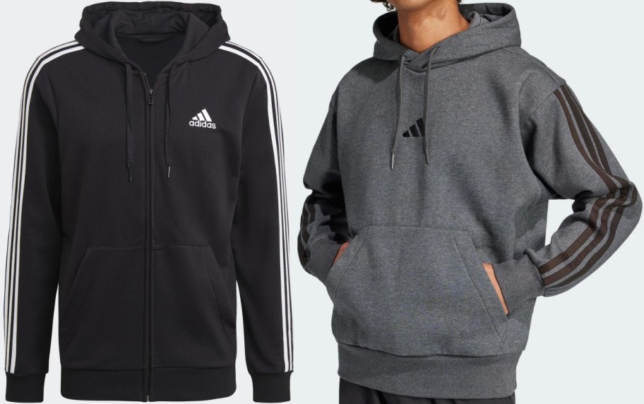 Two Adidas hoodies: a black zip-up hoodie with white stripes and a white logo, and a dark grey pullover hoodie with matching stripes on the sleeves and a black logo.