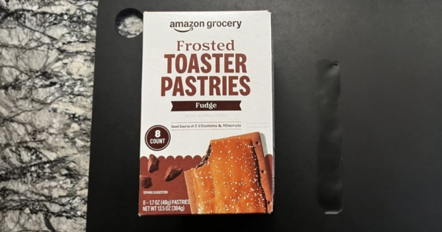 a box of toaster pastries on a cutting board