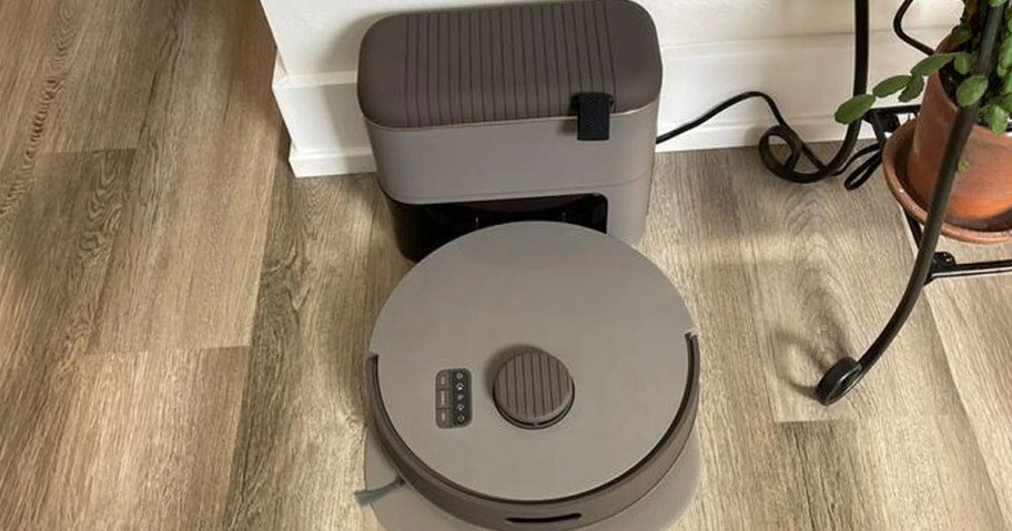 bObsweep Auto-Empty Robot Vacuum & Mop on the floor in a living room