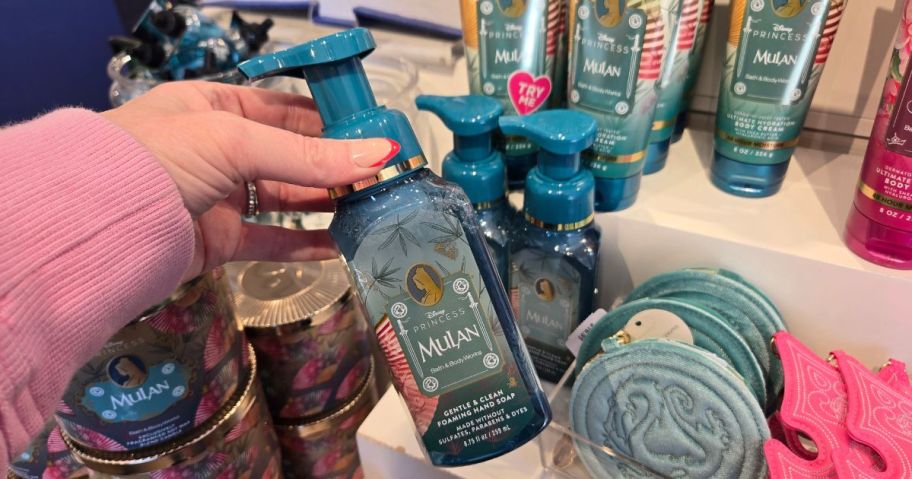 hand holding a bath and body works hand soap in store