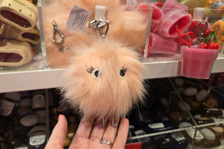 fluffy bal sanitizer holder in store