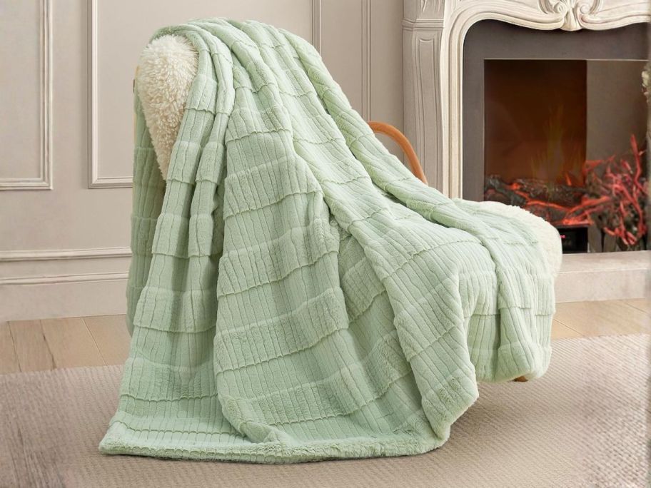 green blanket on chair