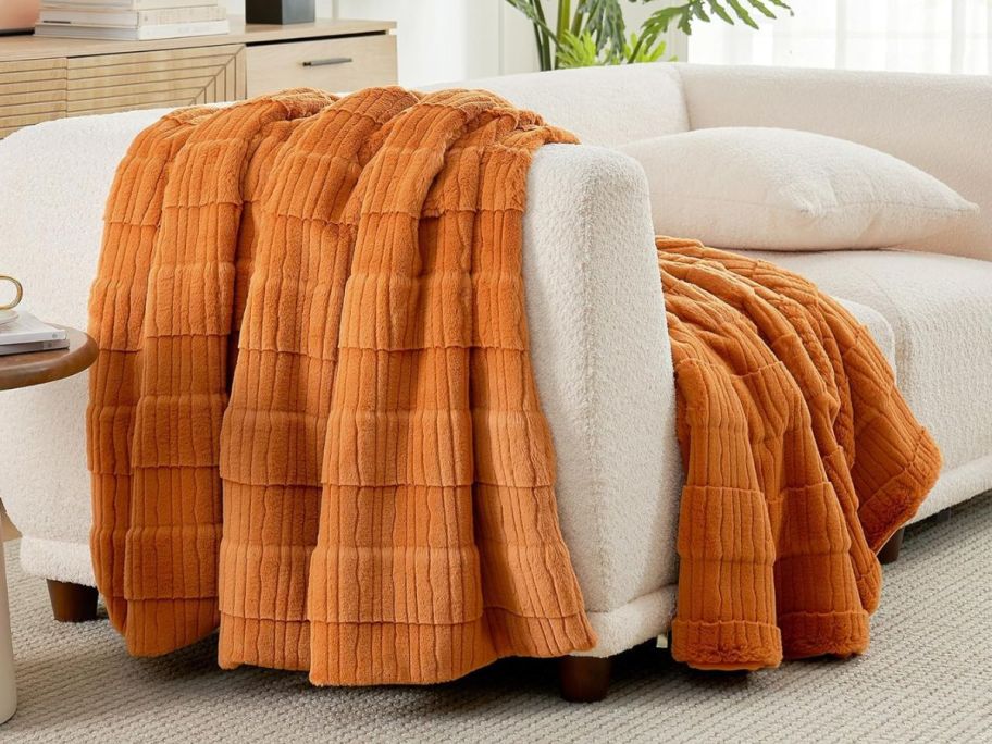 brown blanket on couch