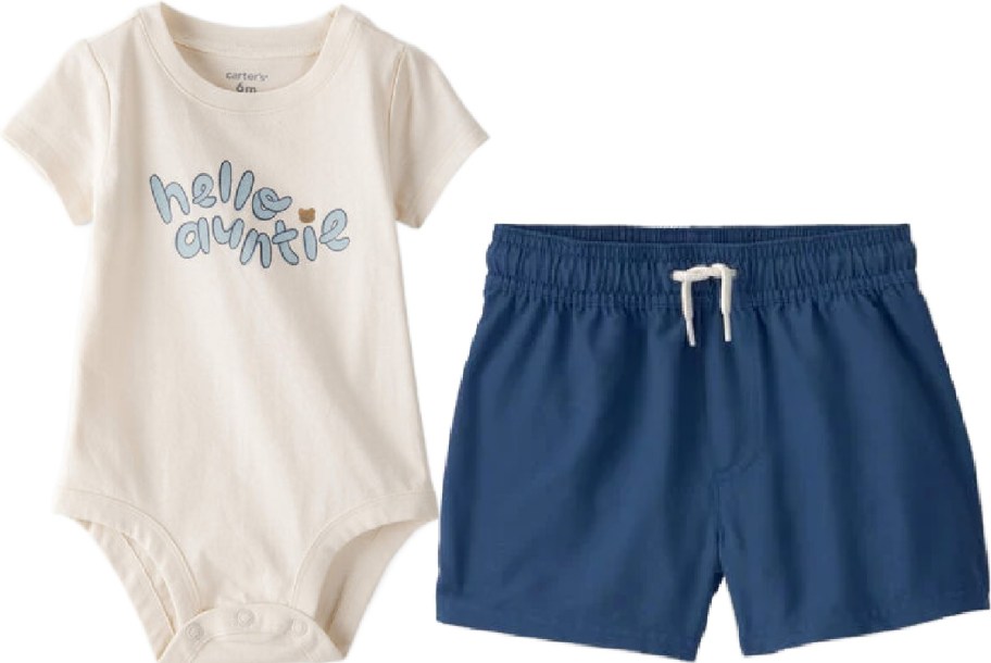 Baby outfit featuring a cream onesie with "hello auntie" text in blue and a small heart, paired with navy blue swim shorts.