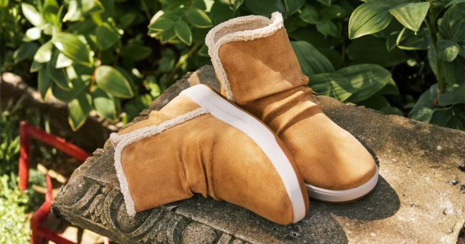 Dearfoams Women's Pine Water-Resistant Energy Return Boots on bench