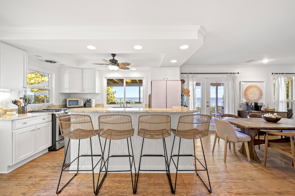 beach house kitchen with bar stools 