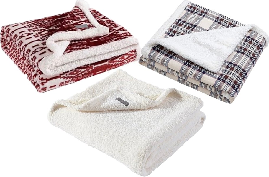 red, blue and white throw blankets folded 