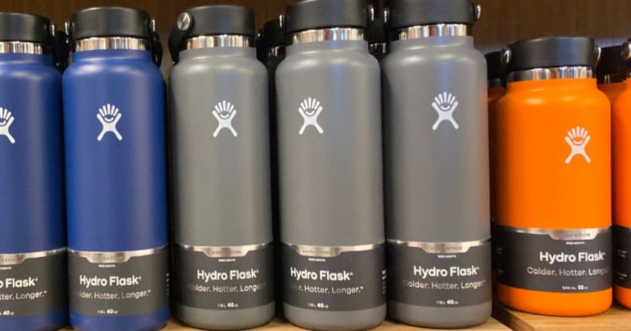 hydro flask tumblers on shelf in store