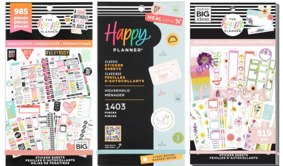 Three various Happy Planner sticker books.