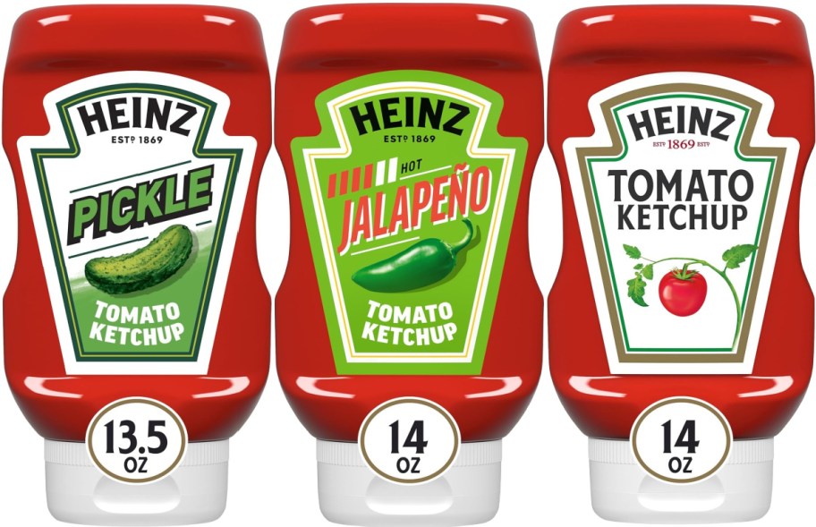 Three bottles of Heiz ketchup. One is pickle, one is jalapeno and one is regular.