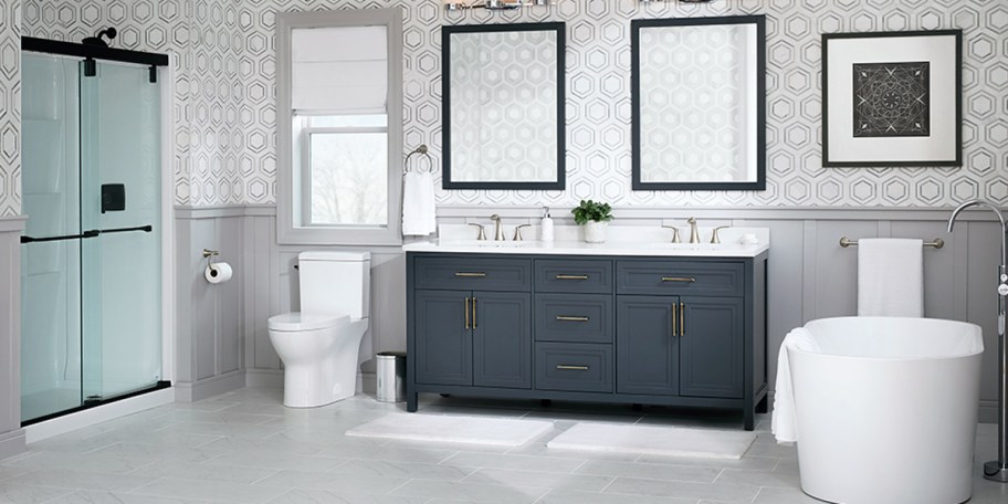 bathroom with blue sink and gray floors 