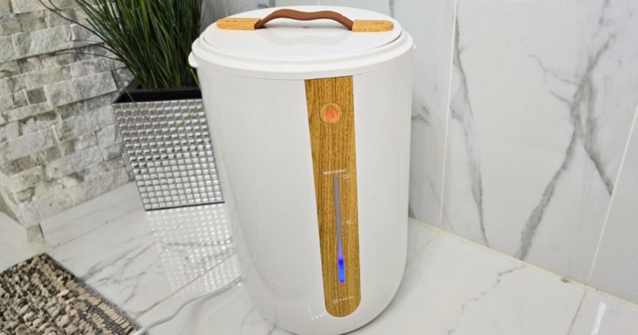 a towel warmer machine in a bathroom