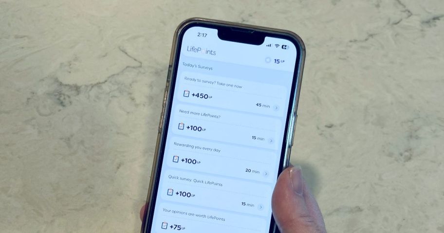 hand holding phone with lifepoints app on it