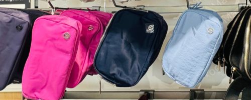 lululemon bags hanging in store