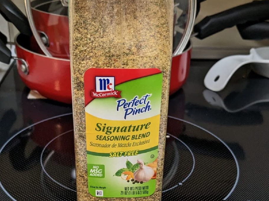 A container of McCormick perfect pinch seasoning.
