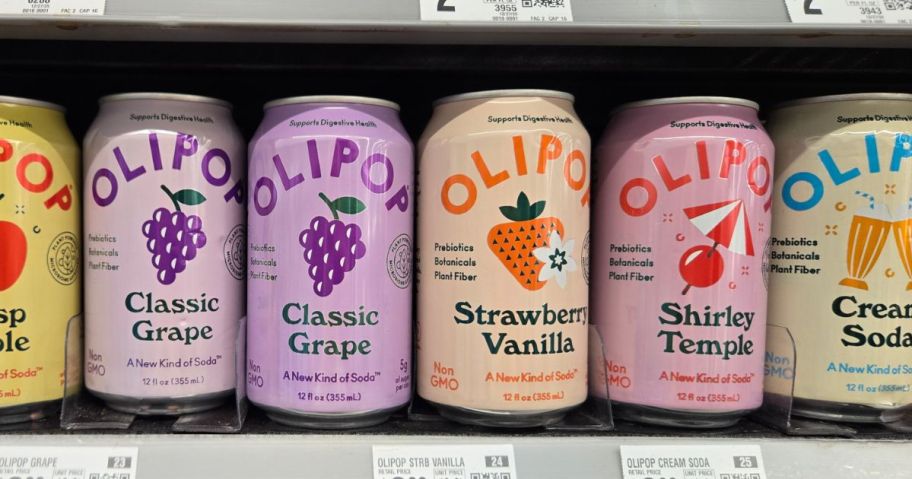 olipop Prebiotic Soda Pop 12oz Cans on shelf in store