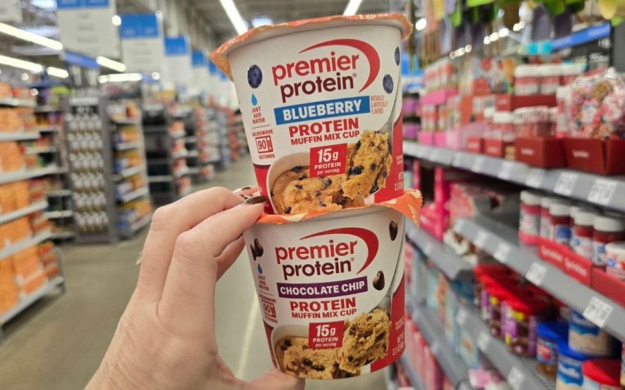 hand holding premier protein muffin mix at the walmart store