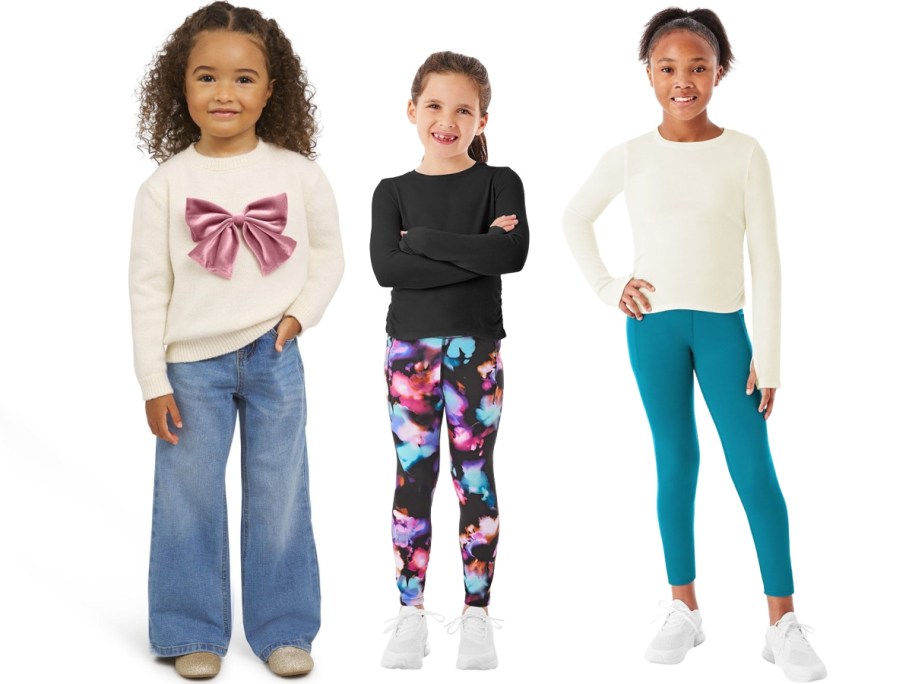 Three kids wearing various clothes at Sam's Club.