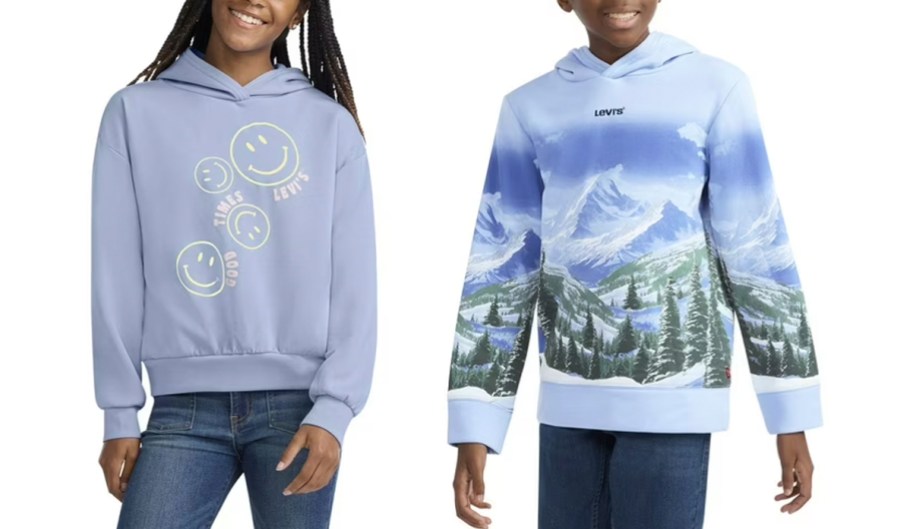 kids wearing blue smiley face and mountain printed hoodies