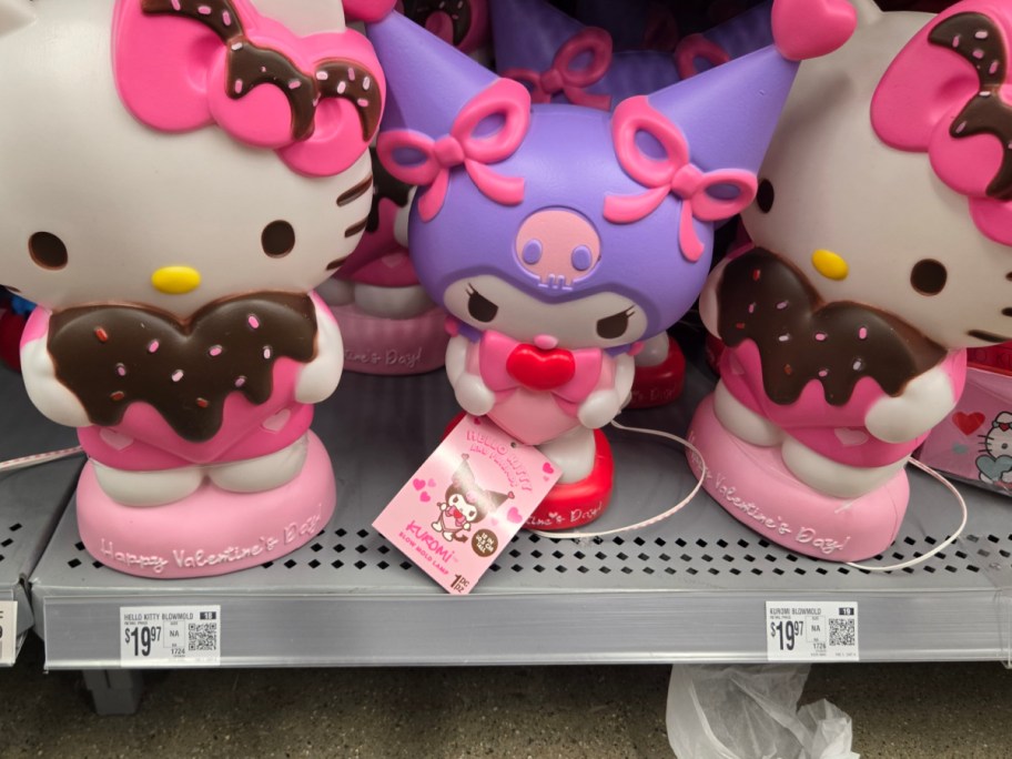 Sanrio Valentine's figurines on a shelf.