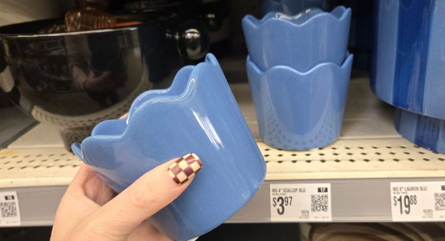 hand holding blue scallop planter