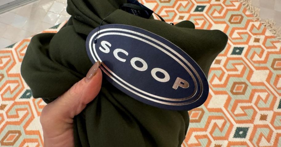 collin holding scoop tag