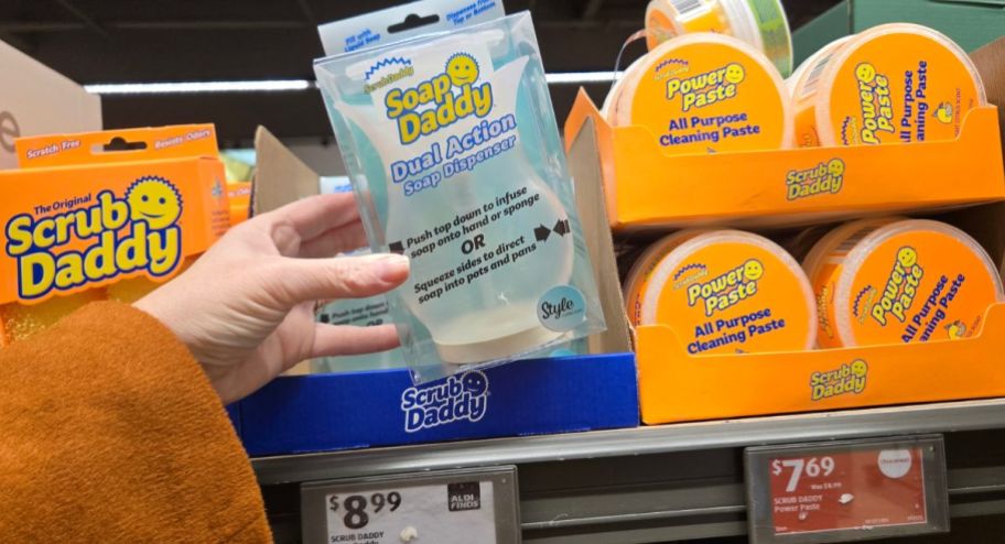 hand holding scrub daddy products