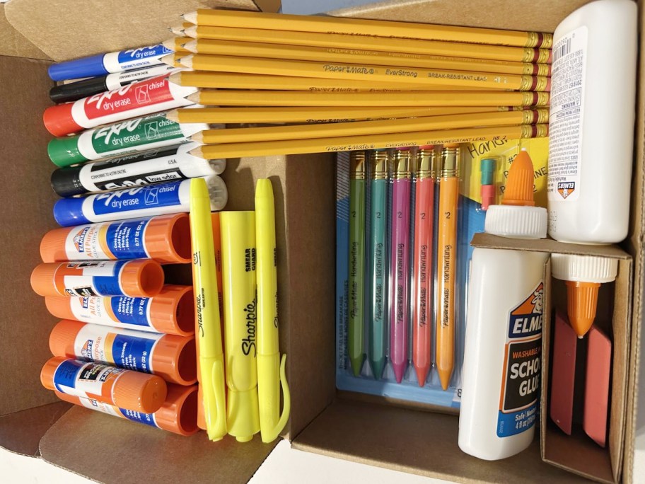 pencils, glue, pens, highlighters and more in box 